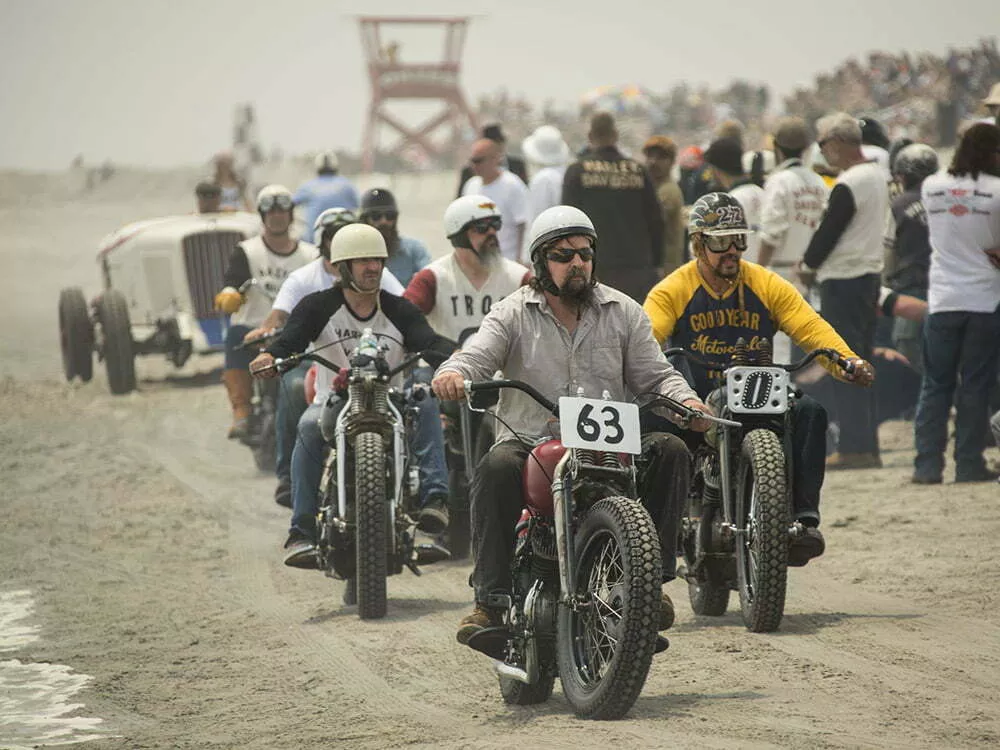 mini parade of bikes and cars