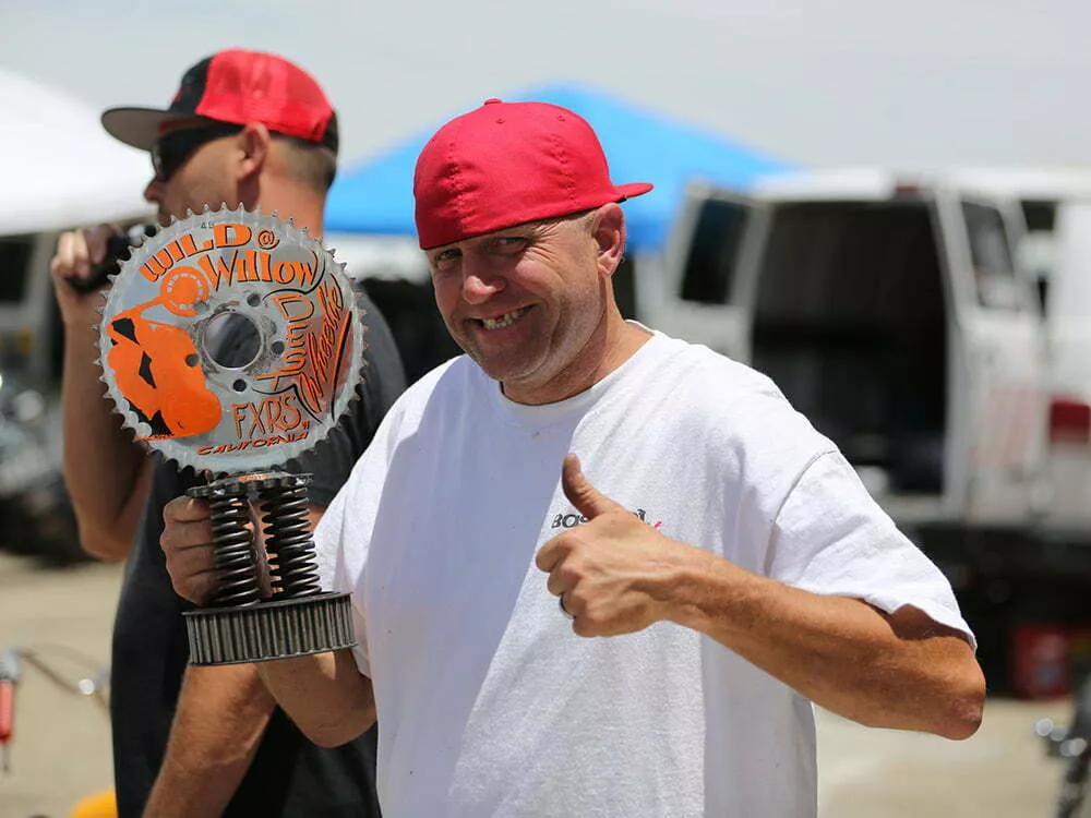 Jason Pullen with the trophy for the wheelie contest