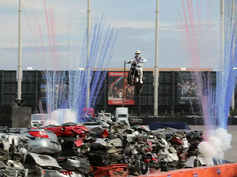 Travis Pastrana motorcycle jumping 52 crushed cars