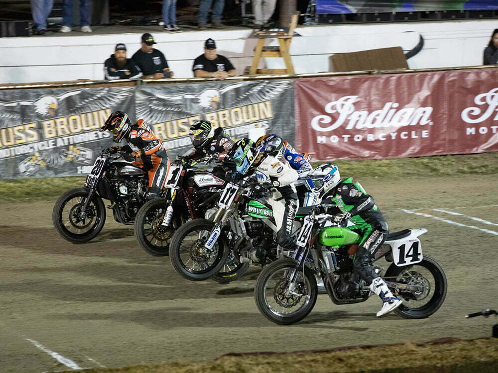 Motorcycles leaving starting line