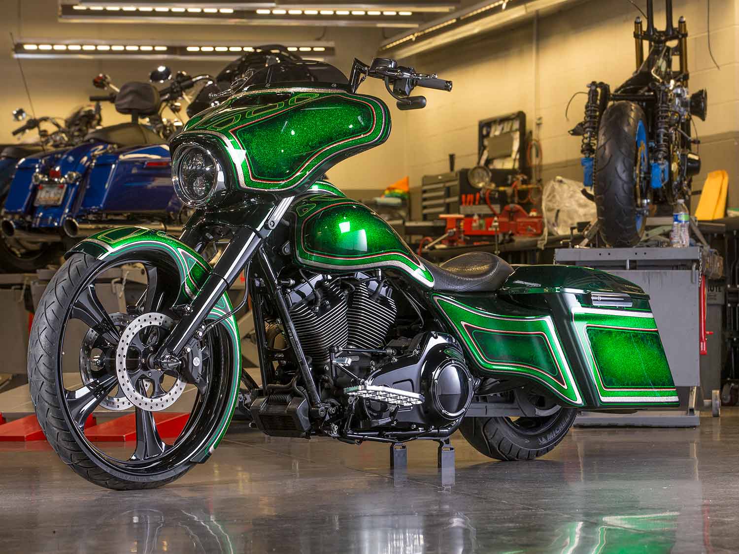 Green flake and striping on custom 2014 Harley-Davidson Street Glide.