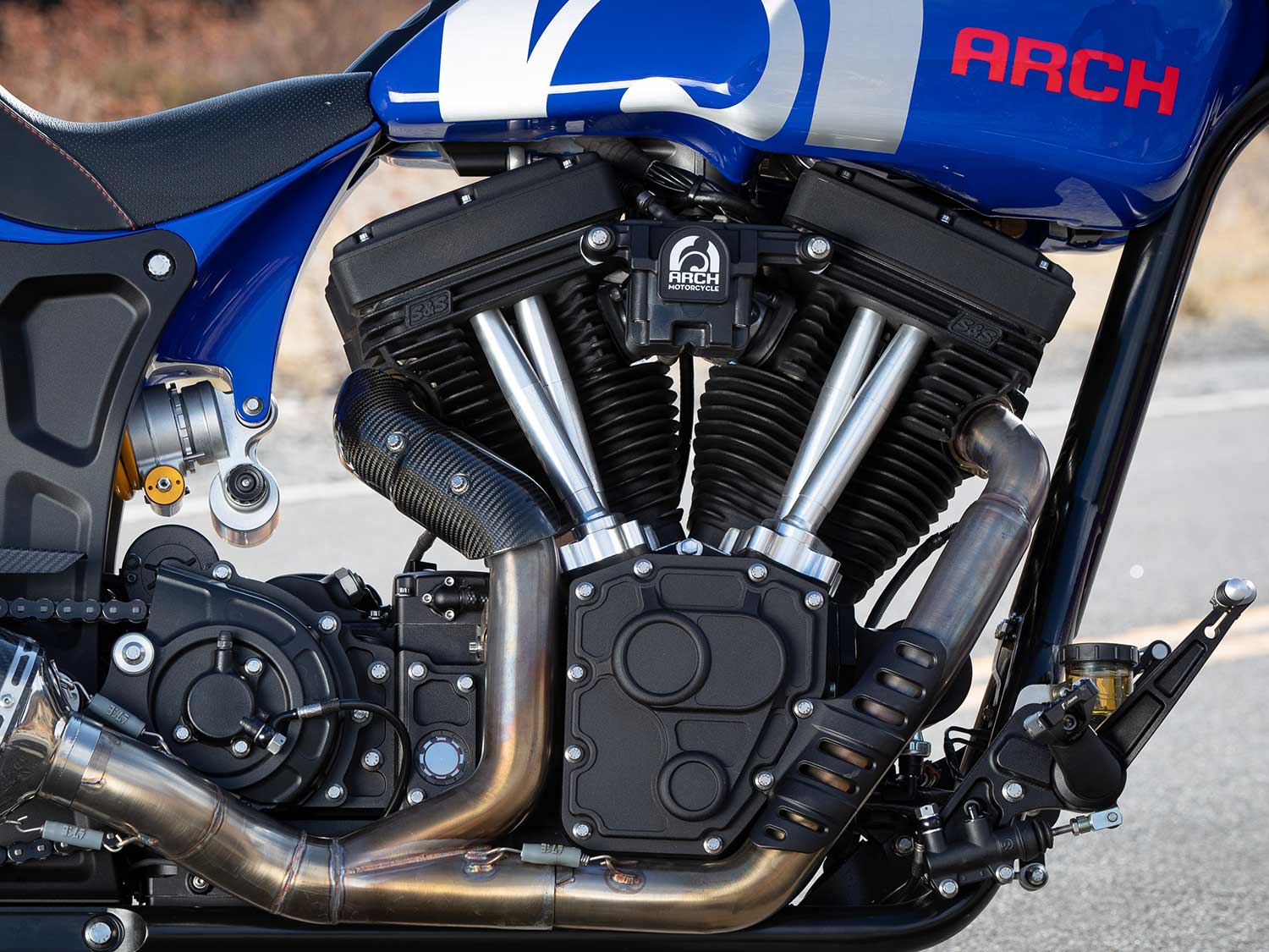 The Arch/S&S 124ci V-twin engine employs a unique Arch downdraft breathing system hidden between the billet aluminum tank halves out of the way of the rider’s legs.