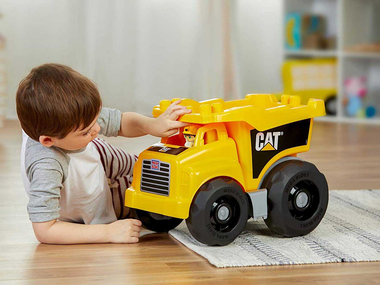 Mega Blok large dump truck comes with a few blocks but is even better matched up with a big collection of Mega Blok.