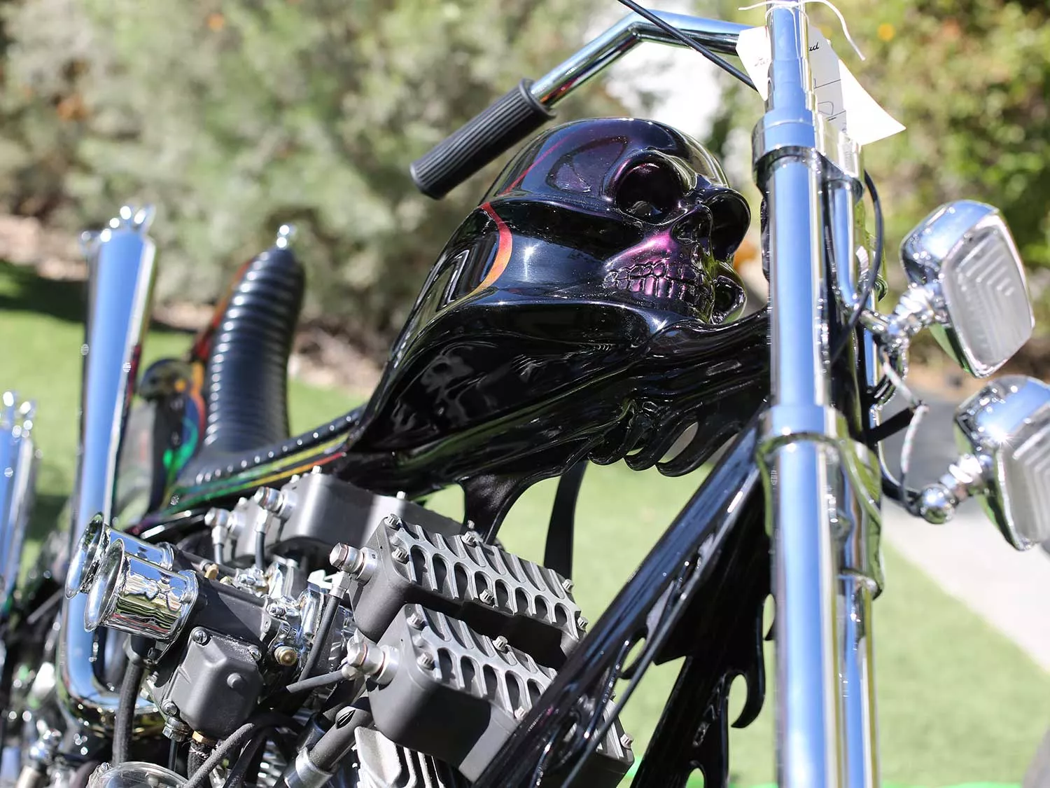 Expensive Trash brought out this skull molded Born-Free Shovelhead and debuted its new Panhead chopper.