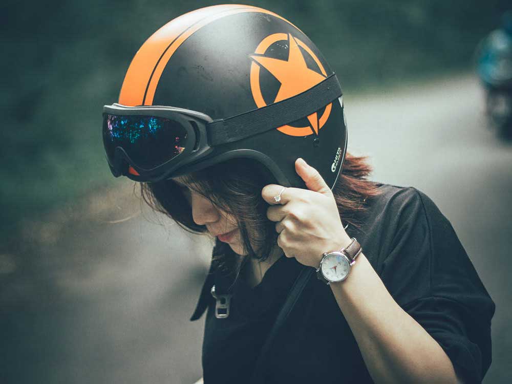 Motorcycle rider wearing goggles.