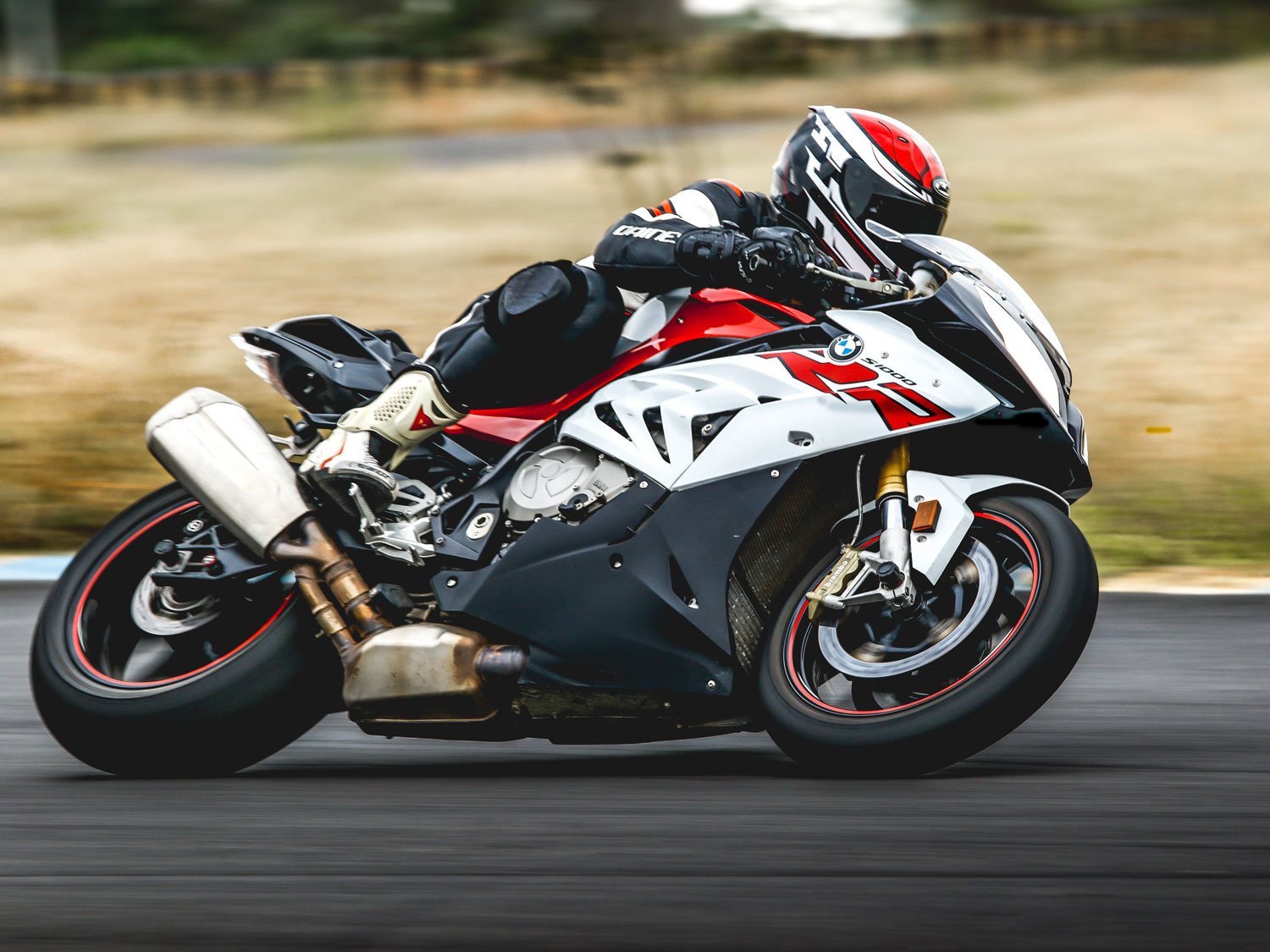 Riding motorcycle on track