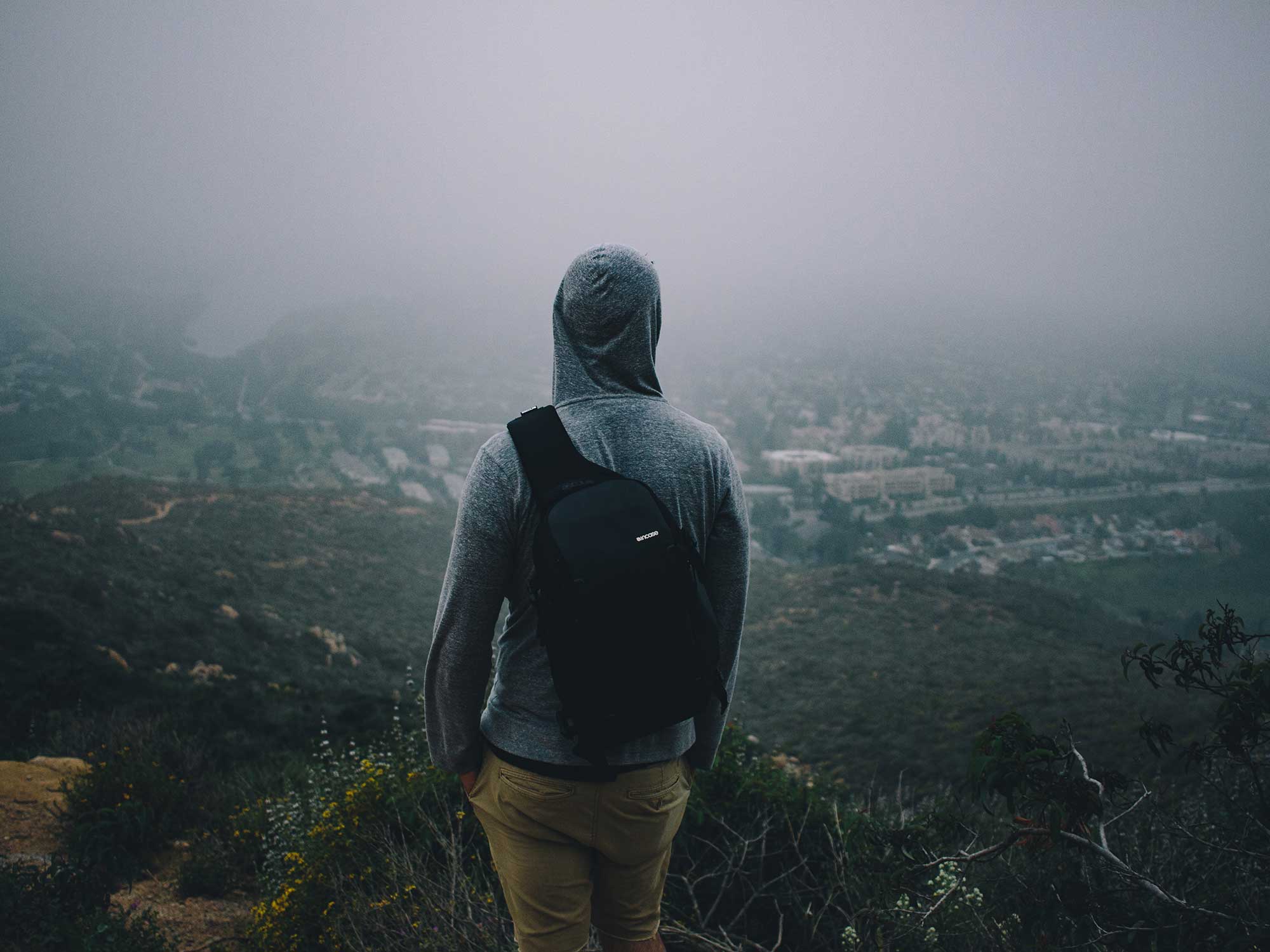 Man looking out over canyon