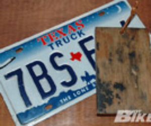 1012_hbkp_plkickstand_puck_with_texas_carriertexas_plate_plywood