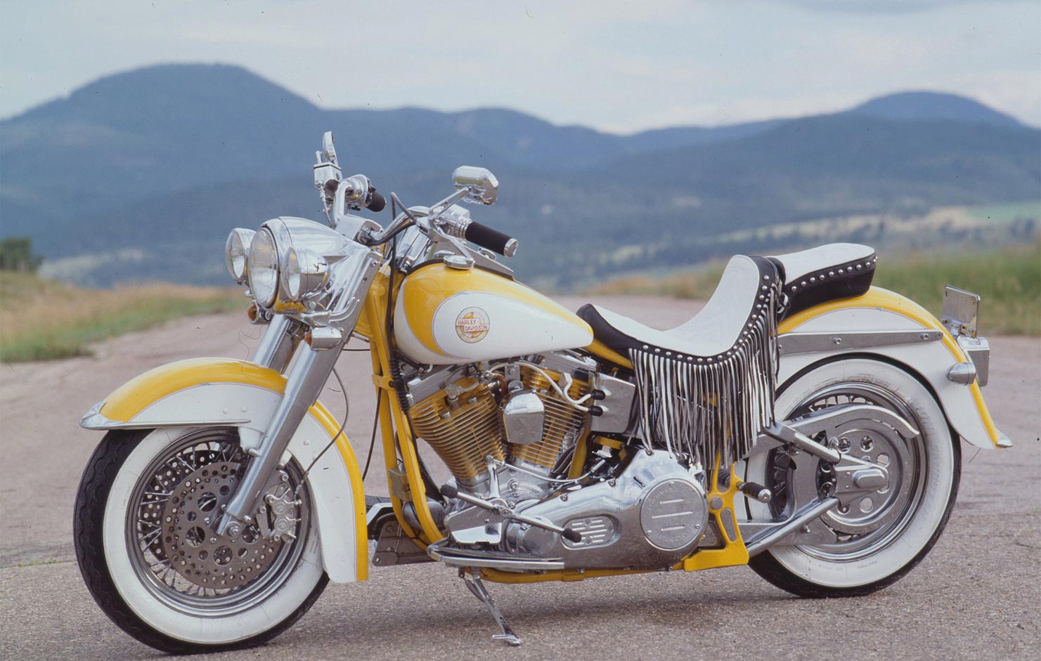This ’93 Softail was transformed into a yellow-on-white Horst-custom-painted beauty by Ron Simms.